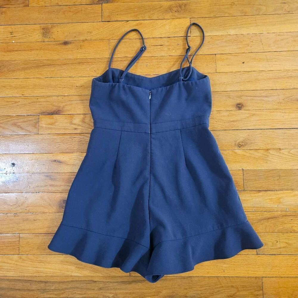 Likely Black Sleeveless Ruffle-Hem Romper - Picture 2 of 4